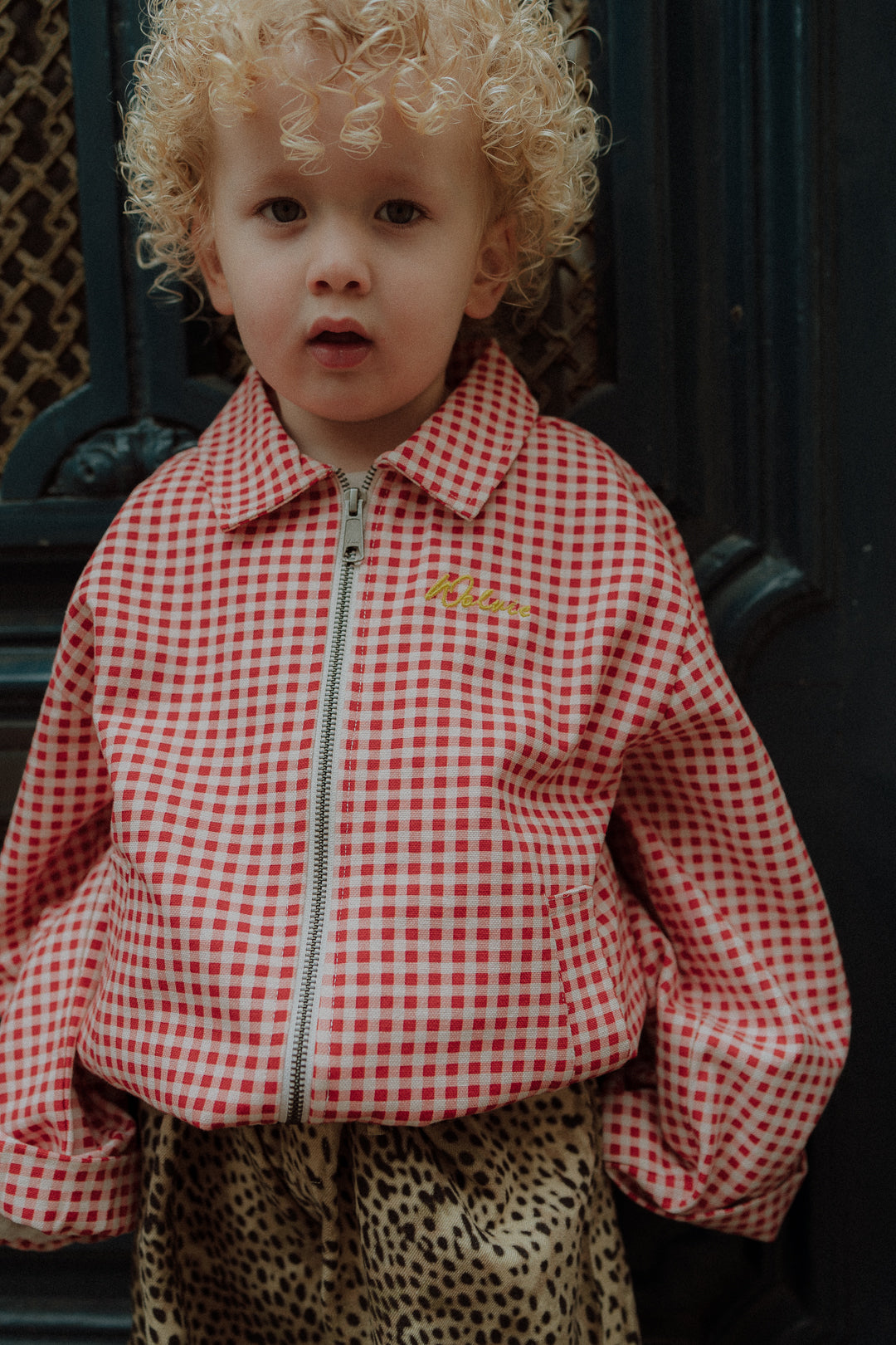 Kids red gingham jacket outfit with leopard pants front view
