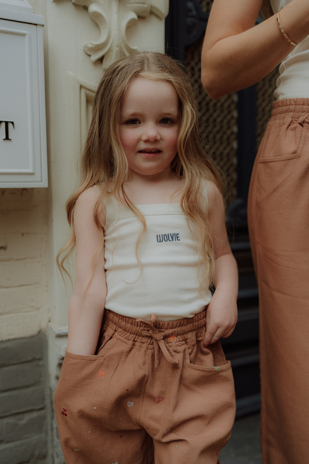 Soft ribbed top and relaxed brown pants for girls by WOLVIE. Comfortable, stylish and perfect for everyday wear.