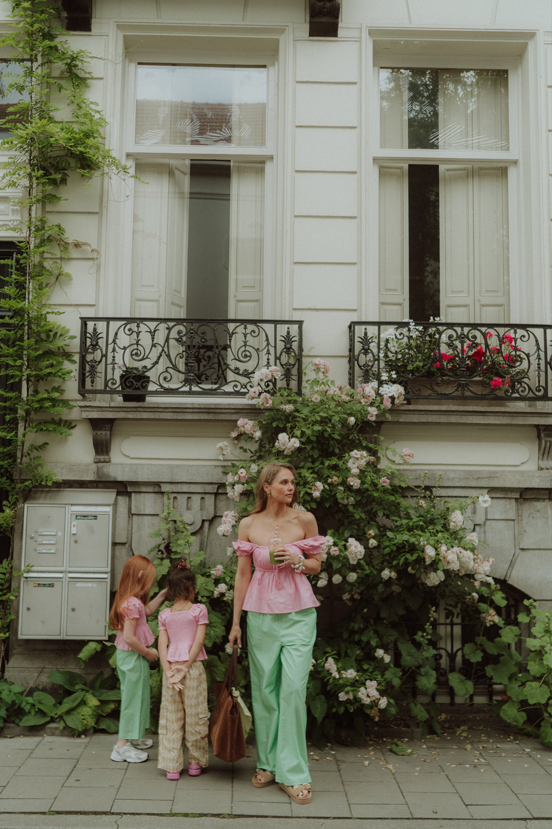 Woman and kids wearing matching set by Wolvie