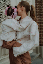 Matching mom and kids outfit with embroidered details from Wolvie SS26 collection