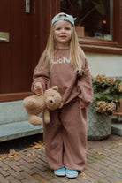 Oversized mauve kids set by Wolvie with teddy bear